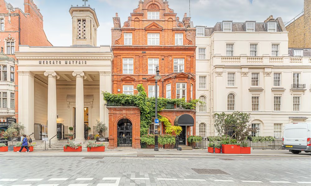 Red brick mansion street in prime London